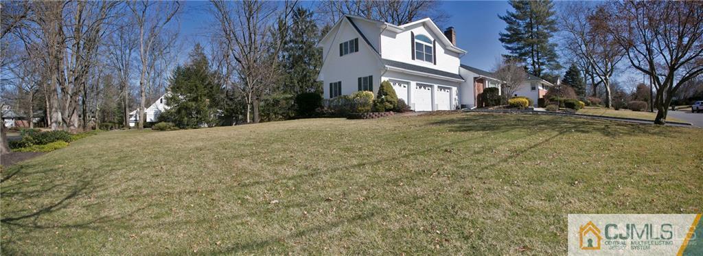 1 Moraine Road Edison, NJ 08820 - Photo 4 of 30 a view of residential houses with yard and trees