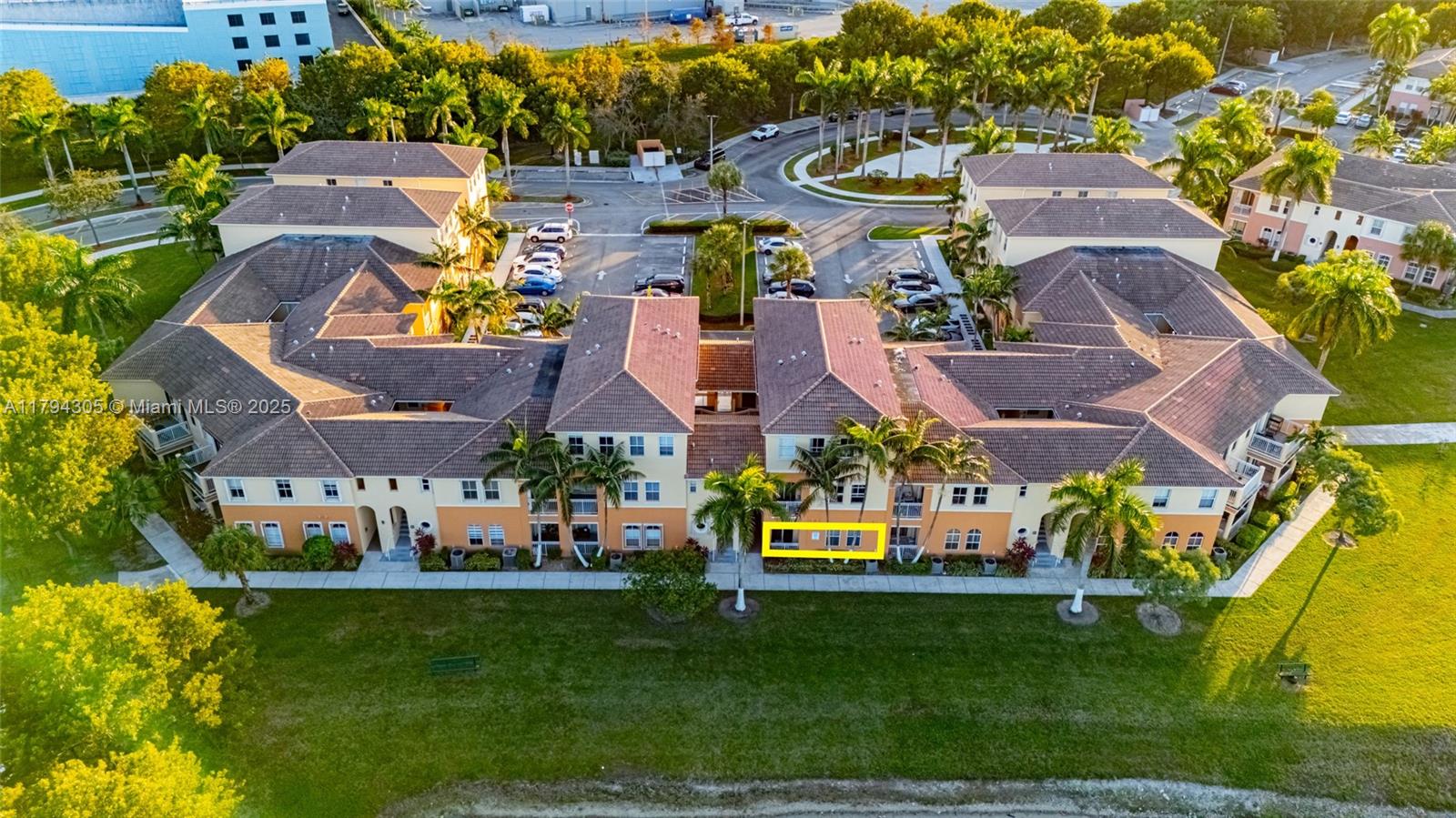 10012 Northwest 7th Street, Unit 107 Miami, FL 33172 - Photo 2 of 44 an aerial view of a house with a garden and swimming pool