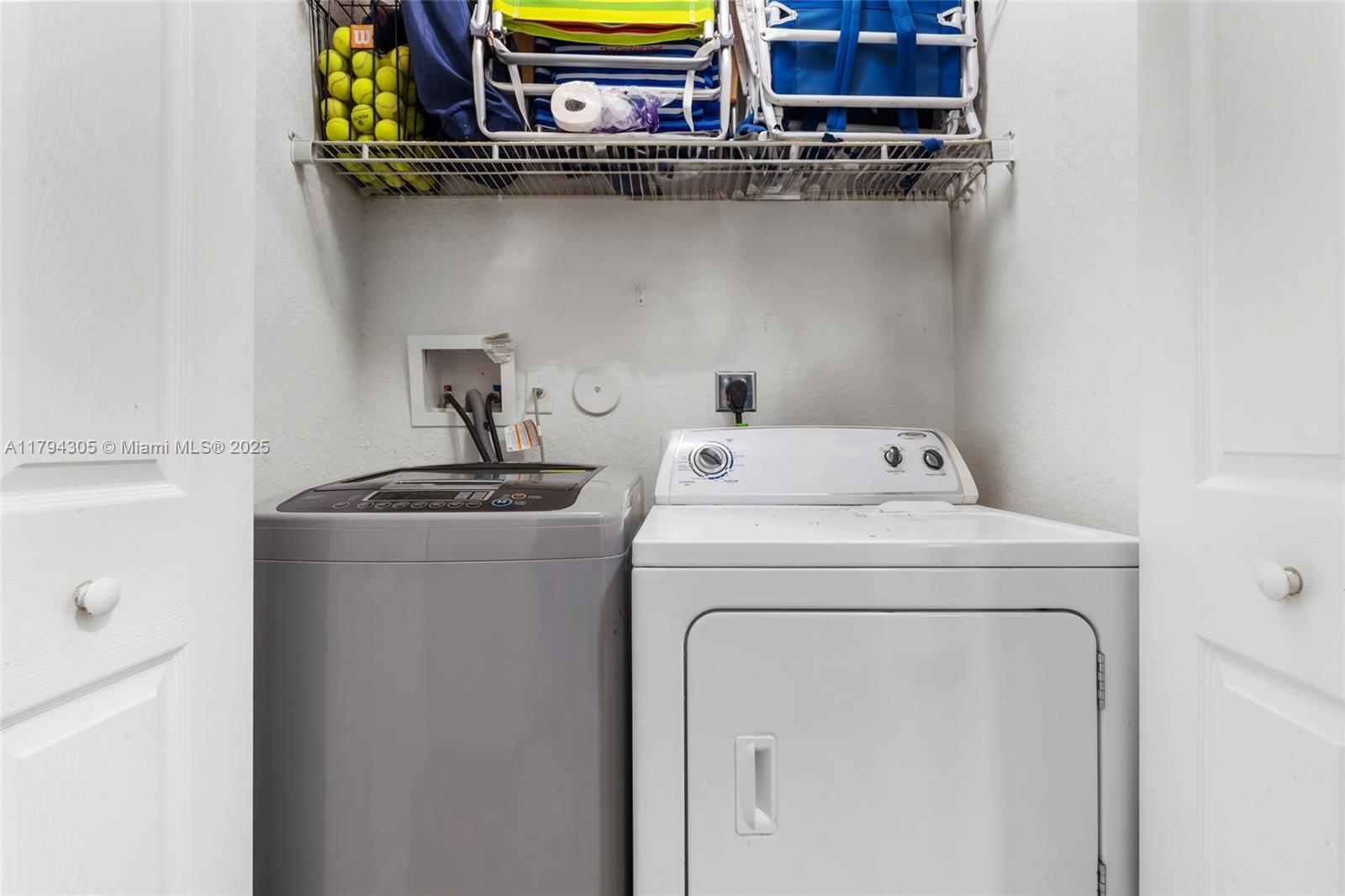 10012 Northwest 7th Street, Unit 107 Miami, FL 33172 - Photo 23 of 44 a utility room with dryer and washer