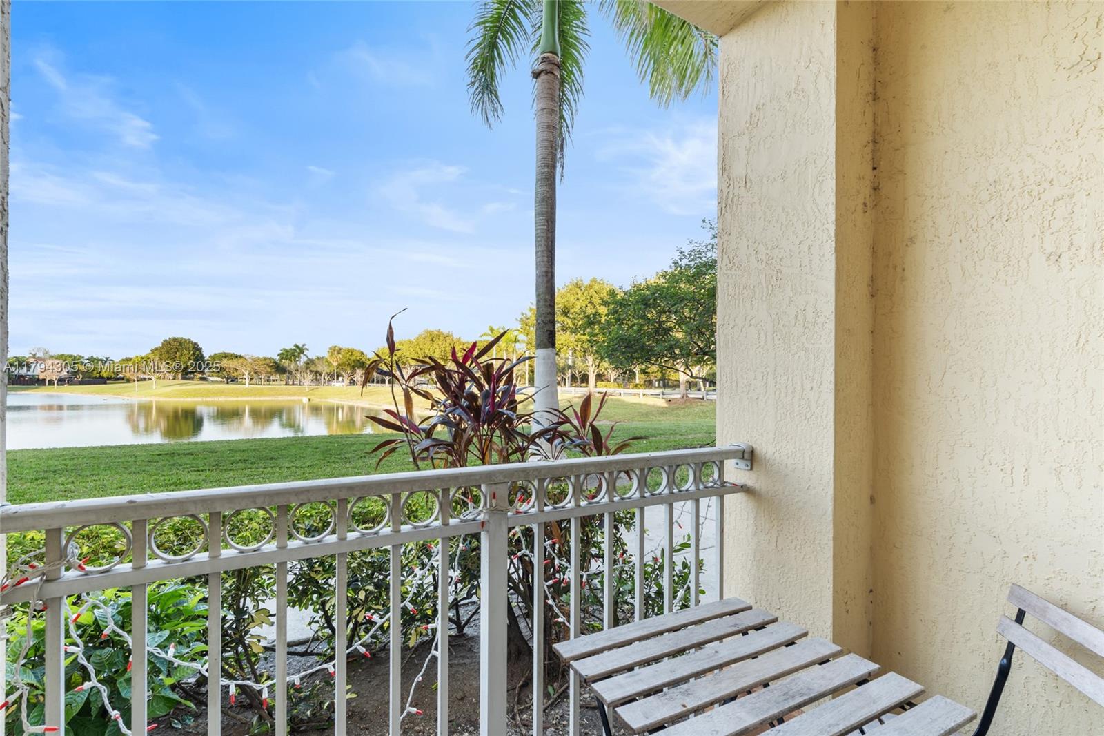 10012 Northwest 7th Street, Unit 107 Miami, FL 33172 - Photo 25 of 44 a view of a balcony with an ocean view
