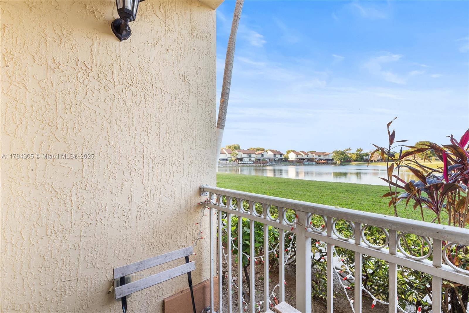 10012 Northwest 7th Street, Unit 107 Miami, FL 33172 - Photo 27 of 44 a view of a balcony with an outdoor space