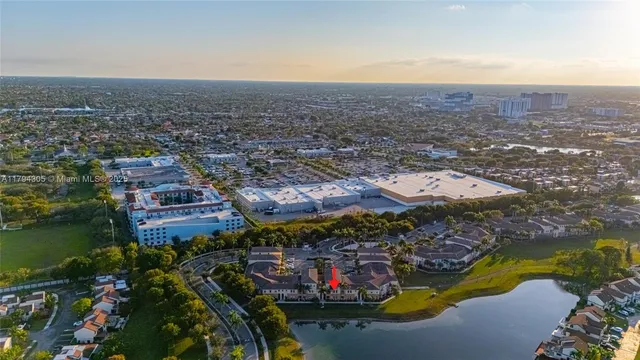 an aerial view of residential building and ocean