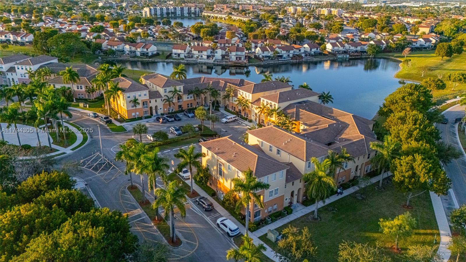 10012 Northwest 7th Street, Unit 107 Miami, FL 33172 - Photo 41 of 44 an aerial view of a house with a lake view
