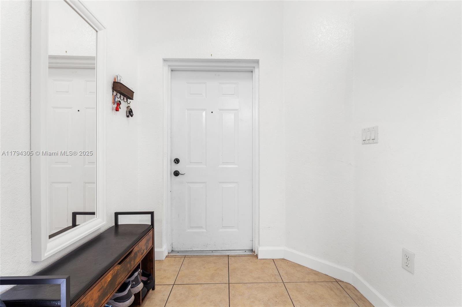 10012 Northwest 7th Street, Unit 107 Miami, FL 33172 - Photo 7 of 44 a view of room with hardwood