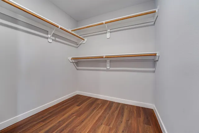 a view of an empty walk in closet