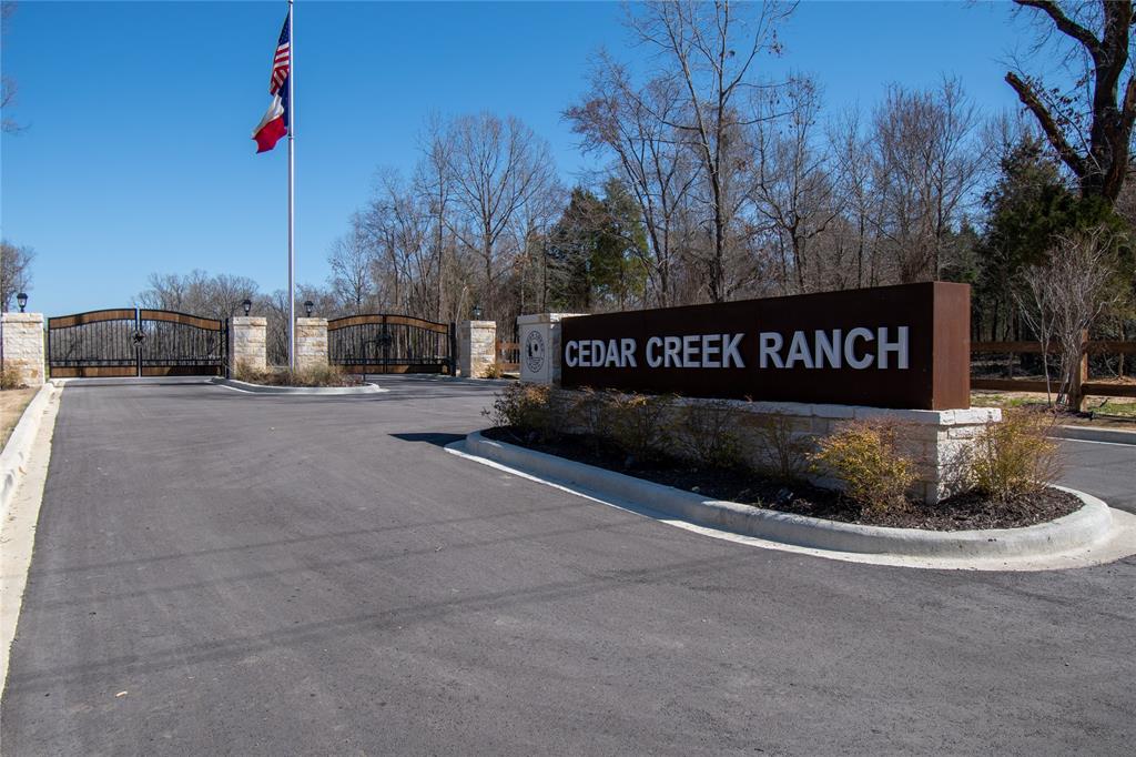 7321 Ranch Oaks Trail Malakoff, TX 75148 - Photo 3 of 21 a street sign is sitting on a sidewalk