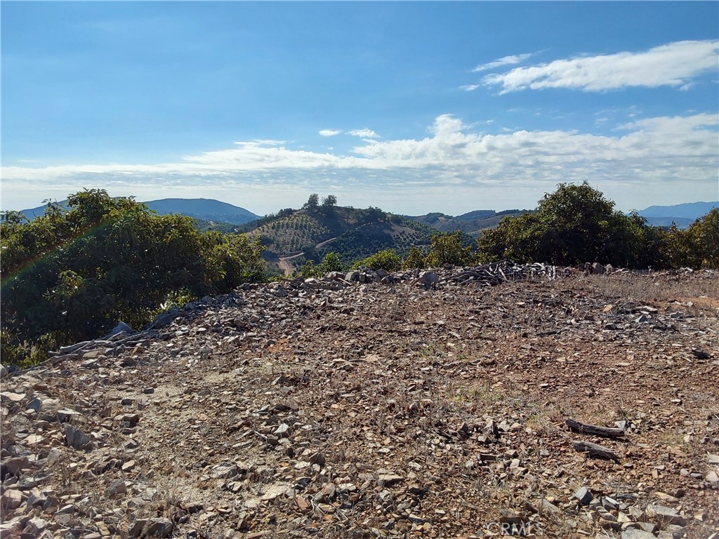 3 Via Vaquero Temecula, CA 92590 - Photo 23 of 38 a view of a lake with mountains in the background