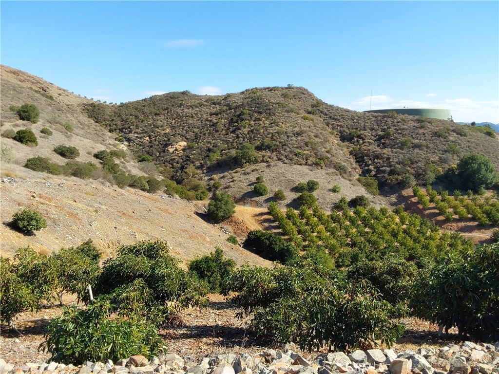 3 Via Vaquero Temecula, CA 92590 - Photo 28 of 38 a view of a mountain range in a cloudy sky