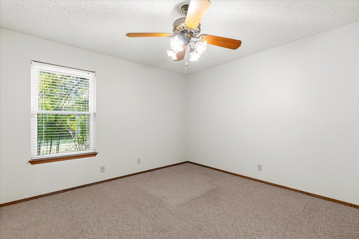 250 Hickory Drive Elgin, TX 78621 - Photo 22 of 37 an empty room with a window