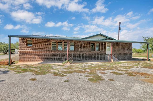 a view of a house with a swimming pool