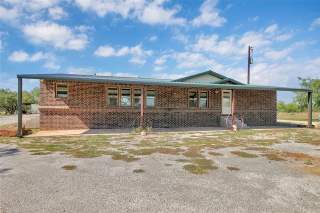 a view of a house with a swimming pool