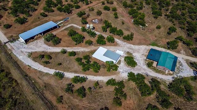 an aerial view of house with outdoor space