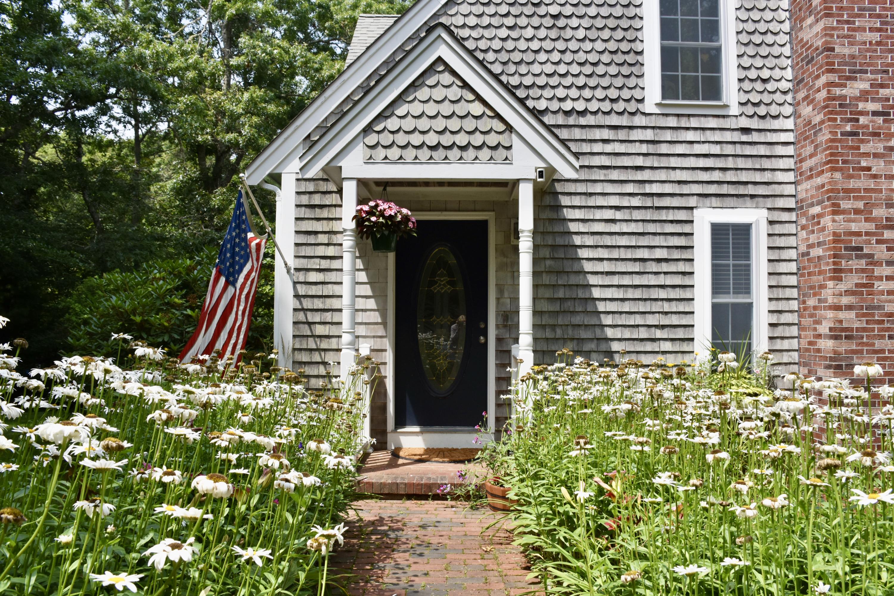 33 Asa Meiggs Road Sandwich, MA 02563 - Photo 2 of 34 a view of a bird door of the house