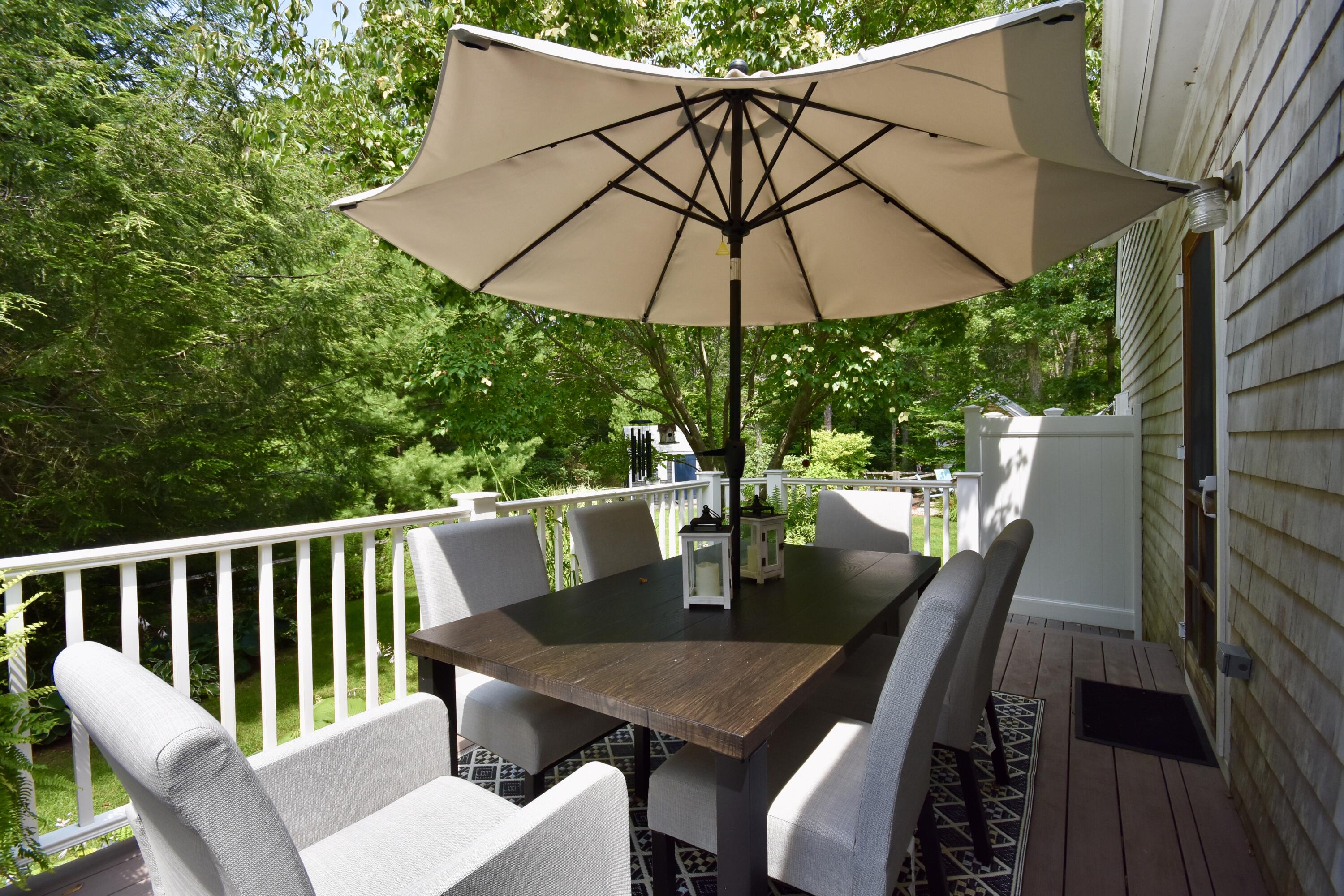 33 Asa Meiggs Road Sandwich, MA 02563 - Photo 5 of 34 a view of balcony with wooden floor and outdoor seating