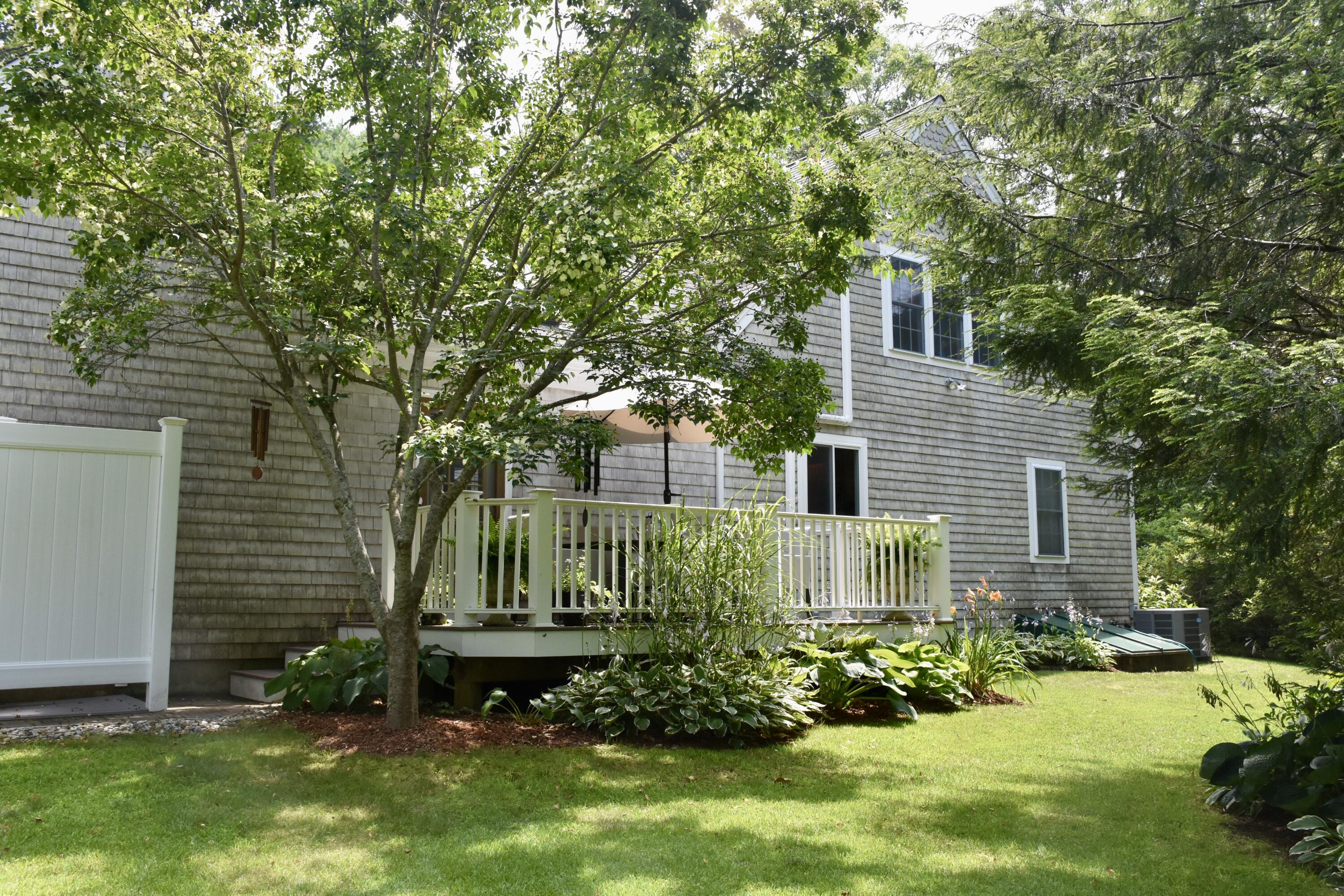 33 Asa Meiggs Road Sandwich, MA 02563 - Photo 7 of 34 a view of a house with a backyard