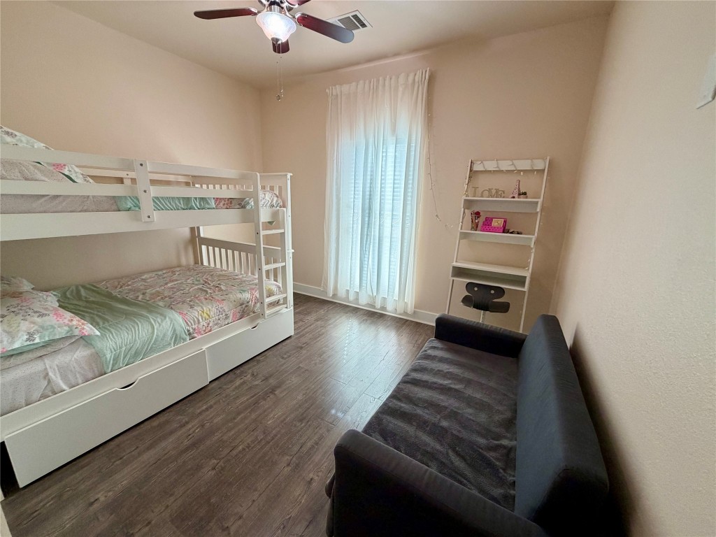 5503 Hiline Road Austin, TX 78734 - Photo 13 of 20 Bedroom featuring dark wood-type flooring and a ceiling fan