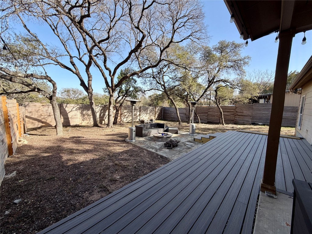 5503 Hiline Road Austin, TX 78734 - Photo 18 of 20 Wooden terrace featuring a fenced backyard and a patio