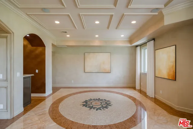a view of a hallway with a flower pot