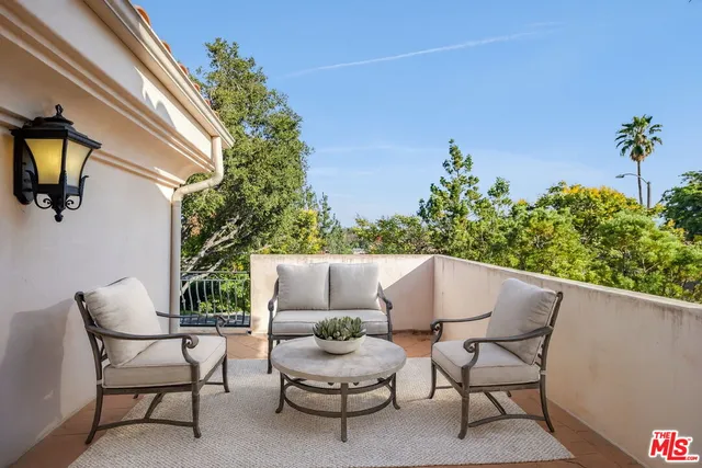 a outdoor living space with furniture and garden