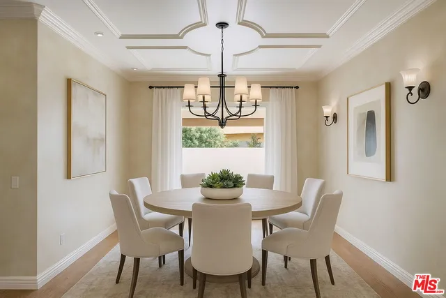 a dining room with furniture window and outside view