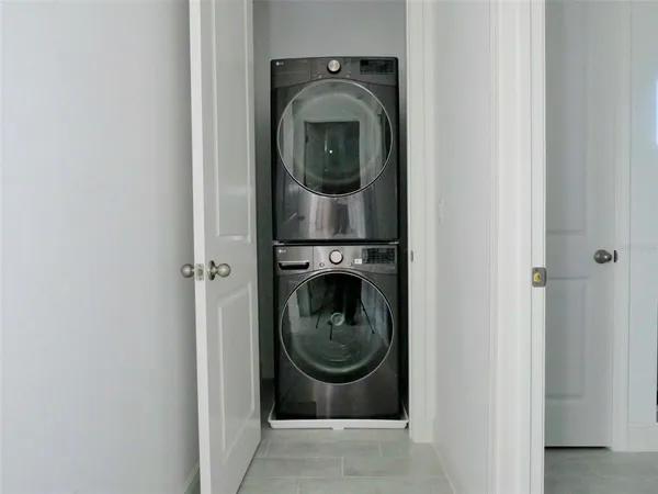 a view of a utility room with washer and dryer