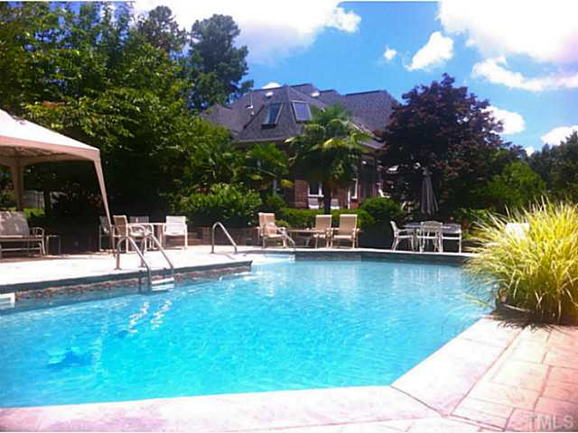 5205 Deergrass Court Raleigh, NC 27613 - Photo 23 of 25 There's plenty of room for furniture around your swimming pool Swimming Pool/Hot Tub/Sauna