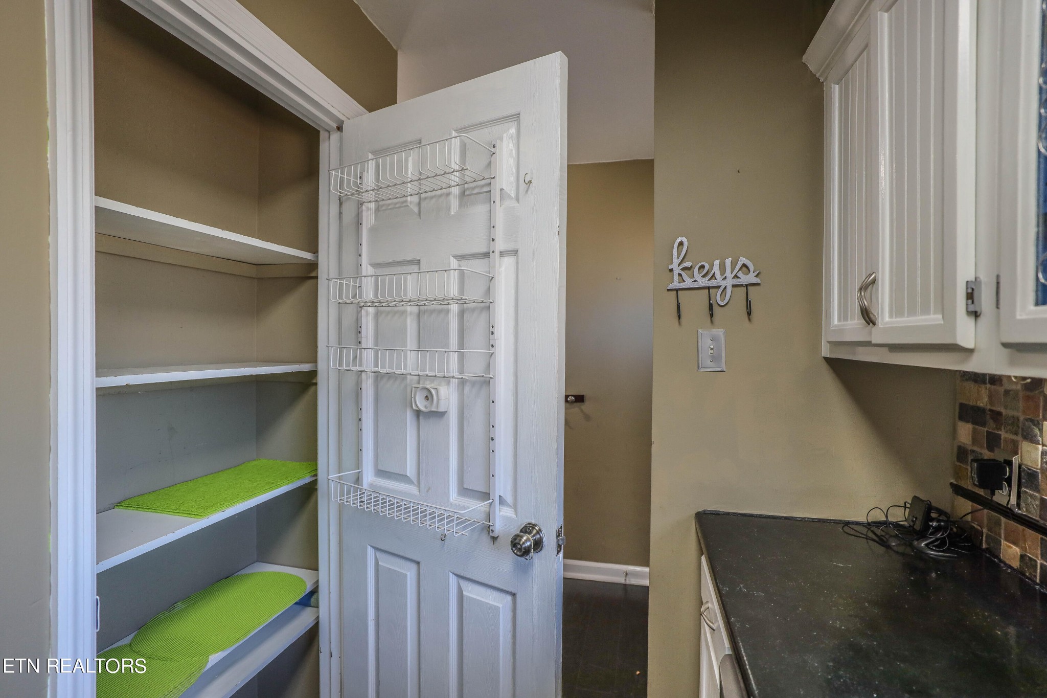1340 Windamere Road Knoxville, TN 37923 - Photo 22 of 53 a bathroom with a sink and a window