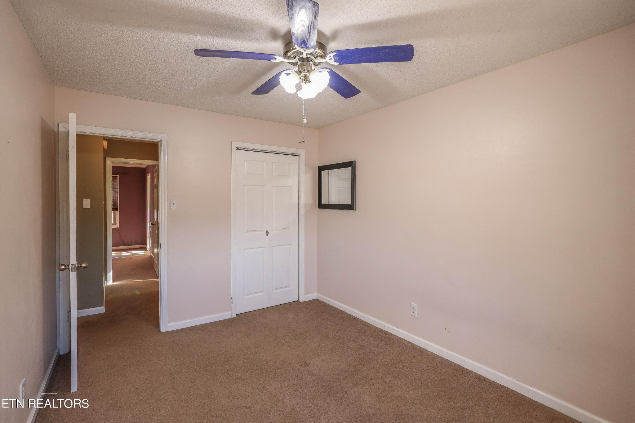 1340 Windamere Road Knoxville, TN 37923 - Photo 30 of 53 a view of a livingroom with a chandelier fan