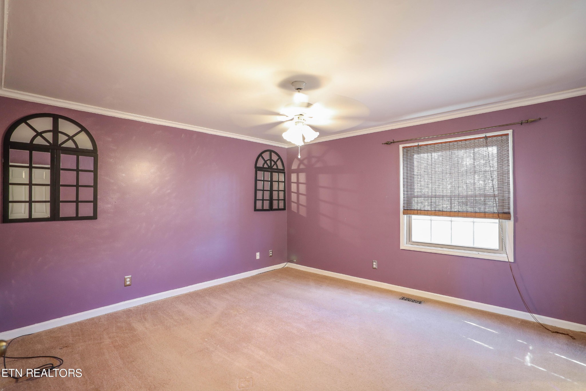 1340 Windamere Road Knoxville, TN 37923 - Photo 33 of 53 an empty room with windows and chandelier fan