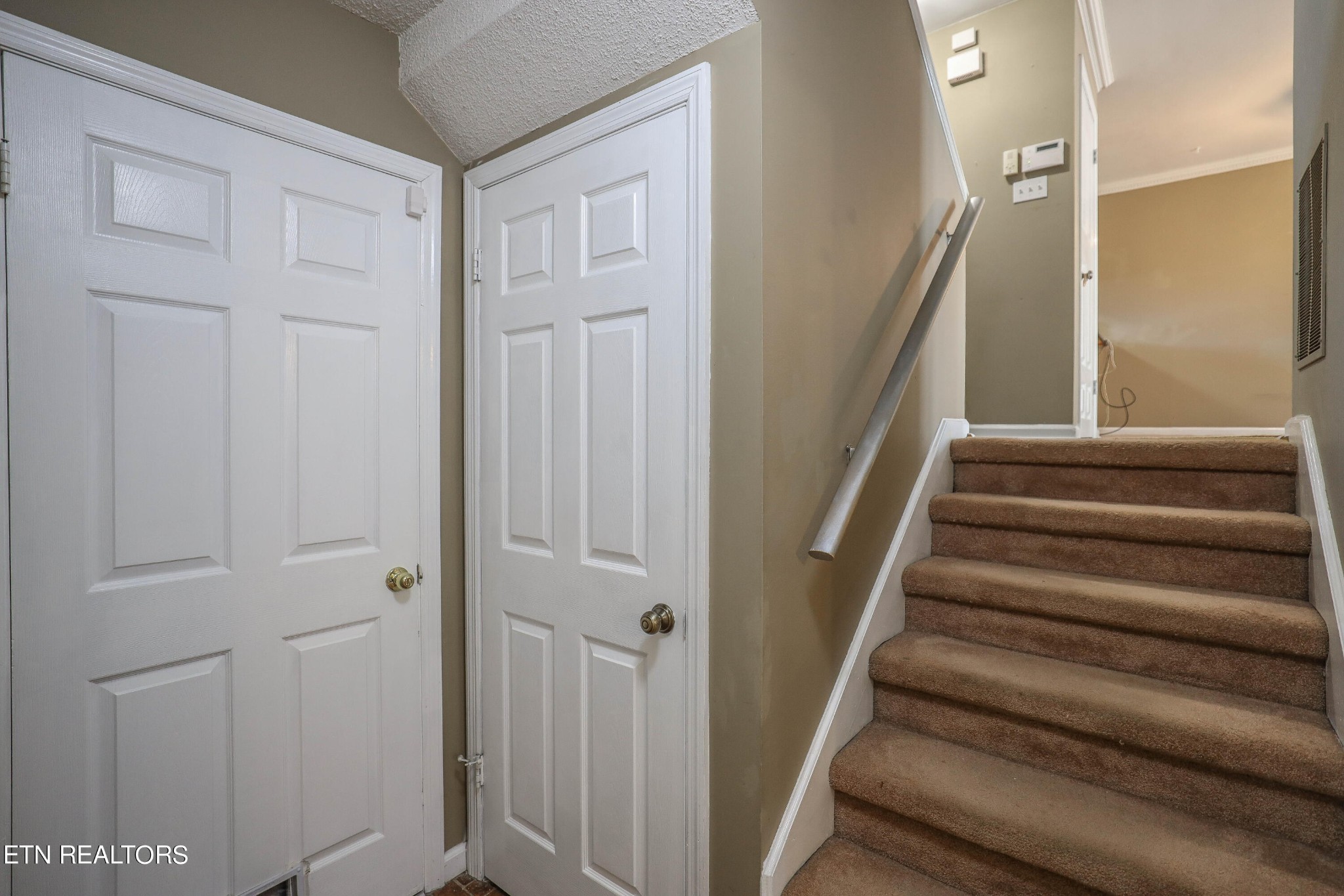 1340 Windamere Road Knoxville, TN 37923 - Photo 42 of 53 a view of staircase with white walls and white door