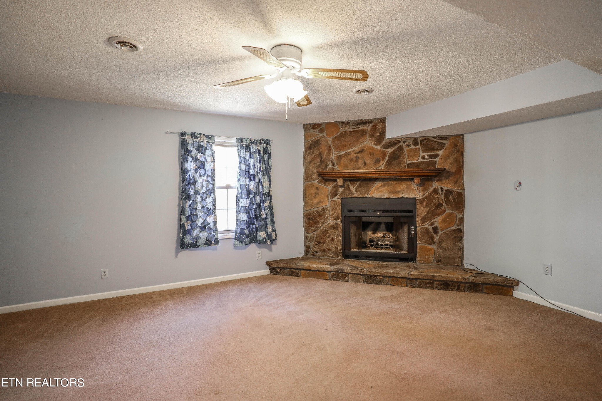 1340 Windamere Road Knoxville, TN 37923 - Photo 44 of 53 a view of fireplace with windows and a fireplace