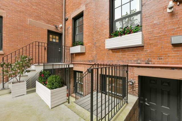 a view of a house with a street