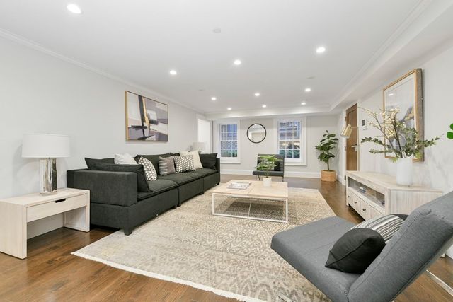 a living room with furniture and a couch