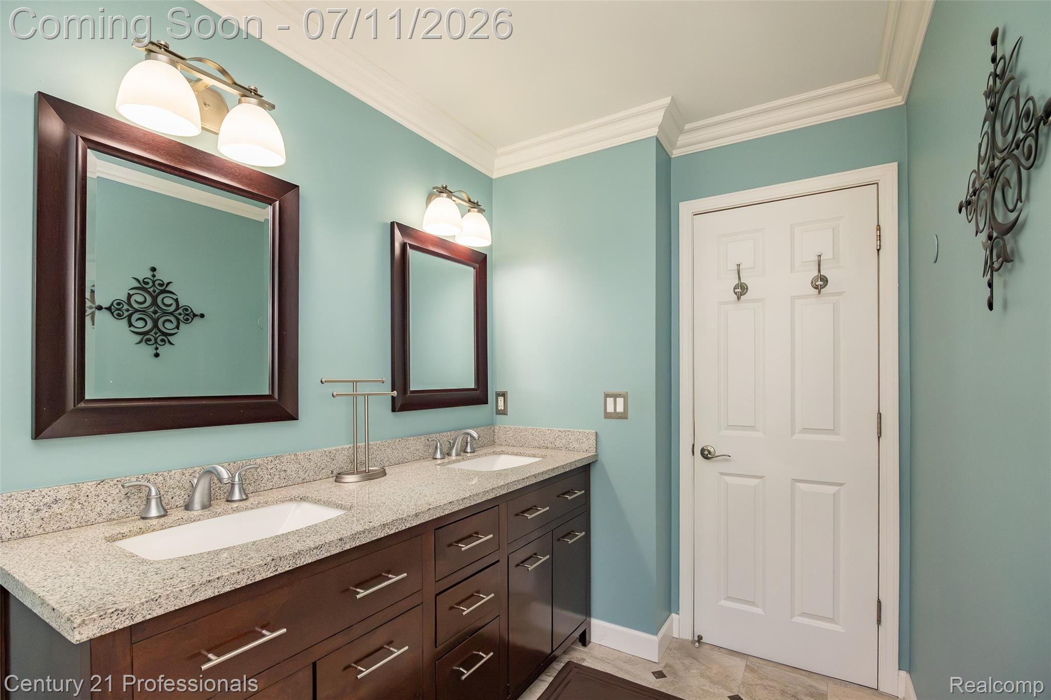 689 Woodfield Way Rochester, MI 48307 - Photo 27 of 61 Dual vanity with granite-finish countertop, undermount sinks, and brushed nickel faucets