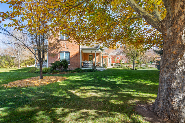 390 North 100 West Monroe, UT 84754 - Photo 3 of 167 View of green lawn featuring a porch