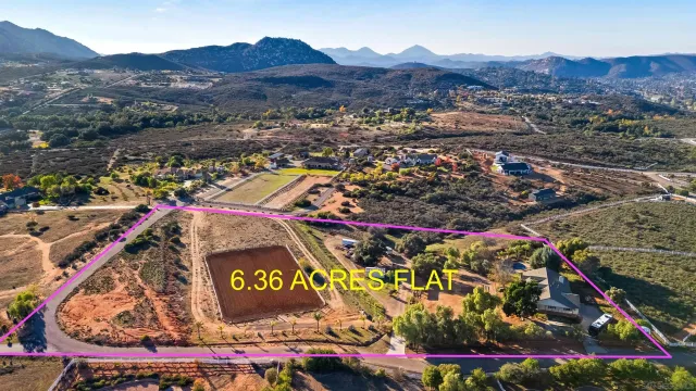an aerial view of swimming pool and mountain view
