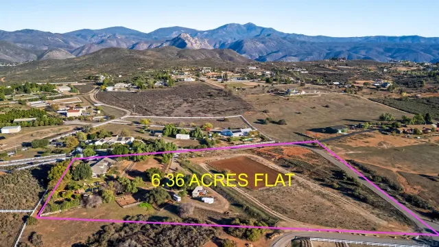 a view of swimming pool with a yard