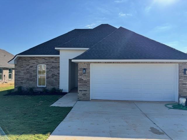 a house view with a garden space