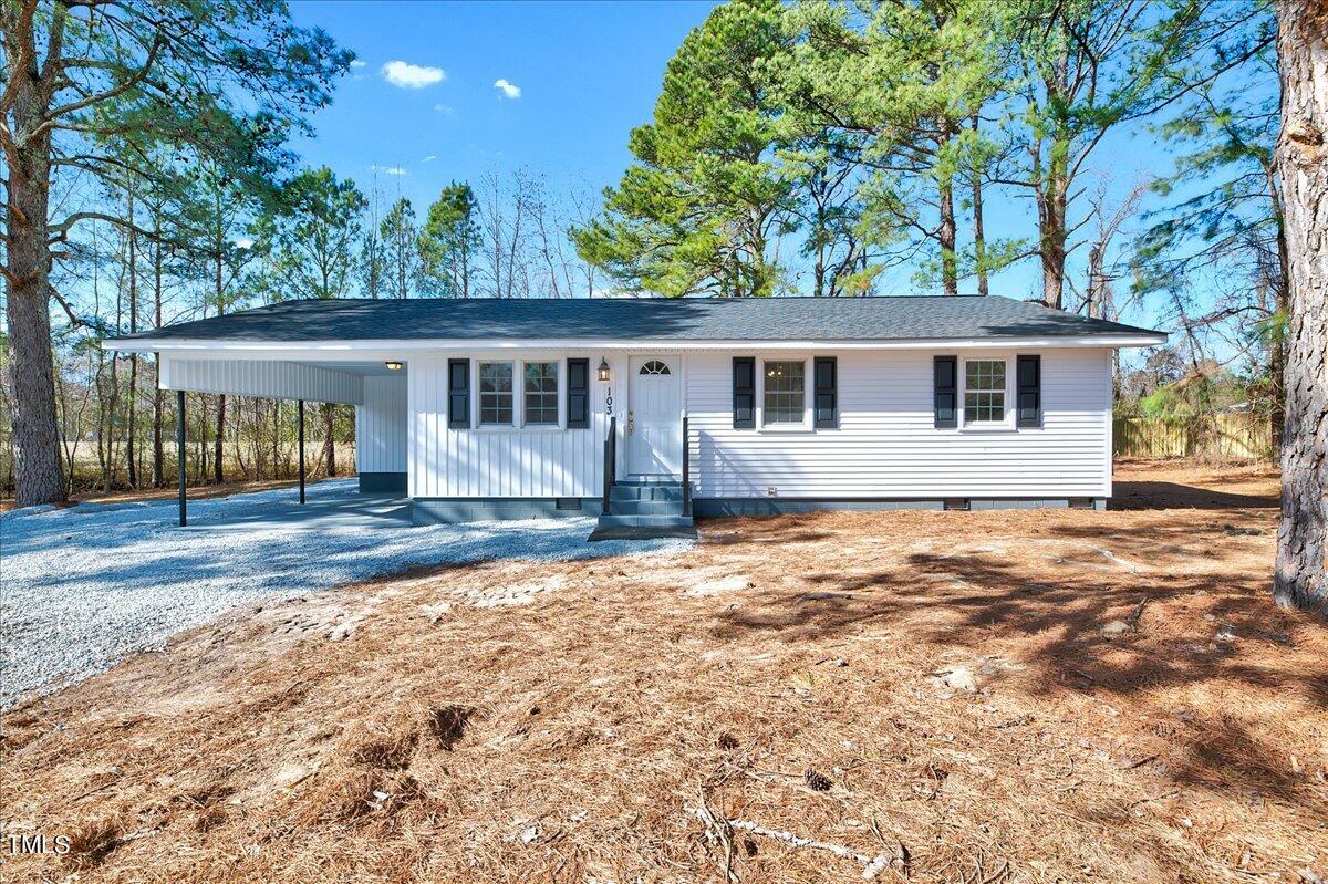 103 Allendale Road Four Oaks, NC 27524 - Photo 1 of 44 front view of house with a yard