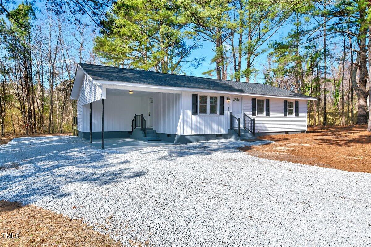 103 Allendale Road Four Oaks, NC 27524 - Photo 2 of 44 a view of a house with a yard