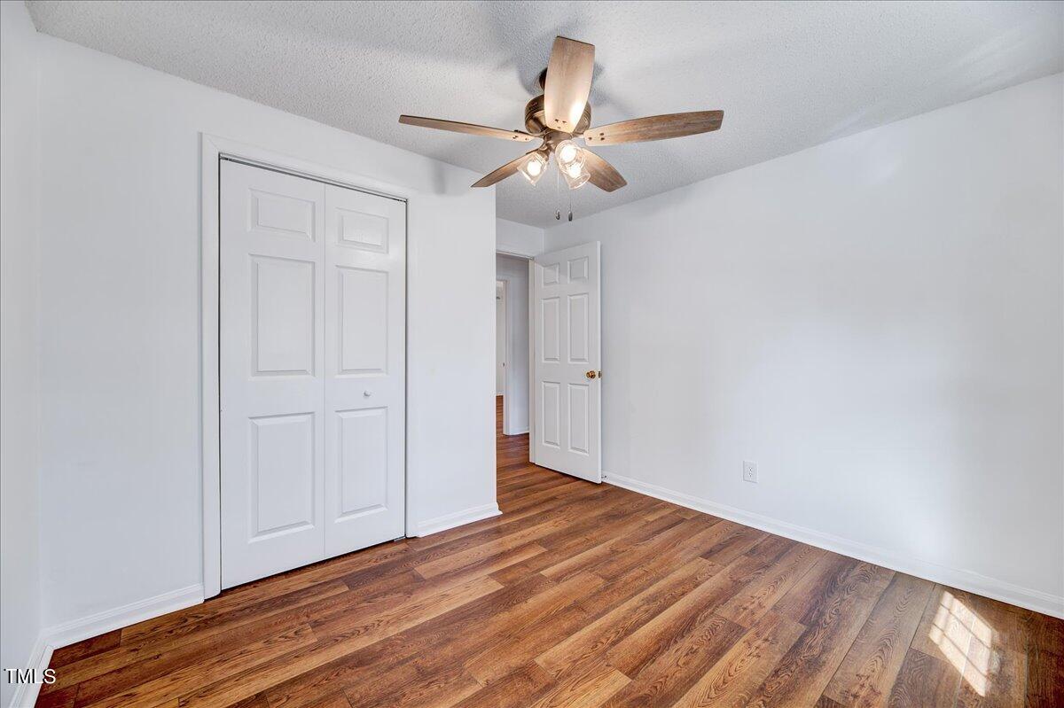 103 Allendale Road Four Oaks, NC 27524 - Photo 23 of 44 wooden floor in an empty room
