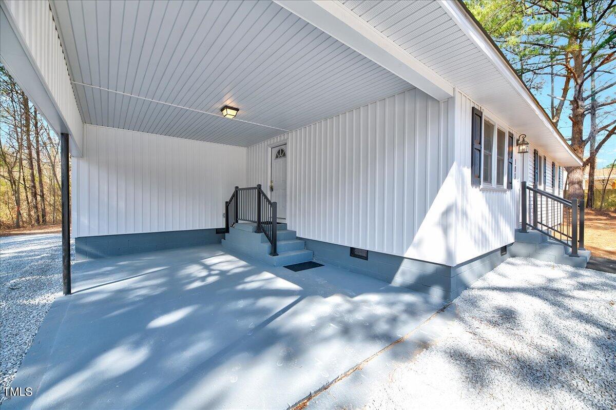103 Allendale Road Four Oaks, NC 27524 - Photo 3 of 44 a view of a house with a yard