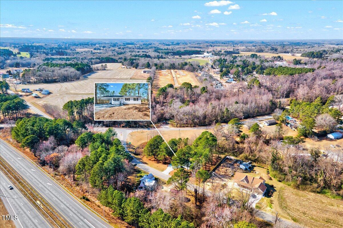 103 Allendale Road Four Oaks, NC 27524 - Photo 36 of 44 an aerial view of residential houses with outdoor space