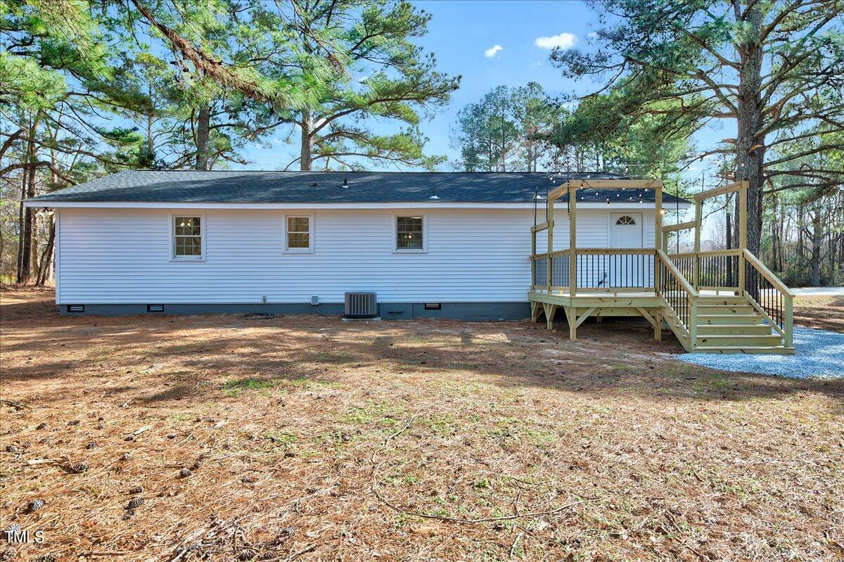 103 Allendale Road Four Oaks, NC 27524 - Photo 6 of 44 a view of a house with a yard