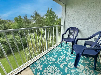 a view of a chairs in a balcony