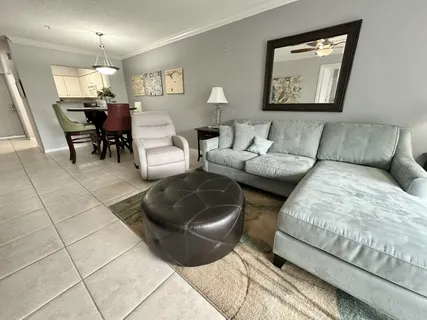 a bathroom with a toilet a sink and a mirror