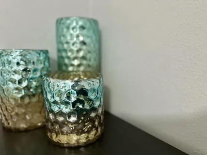 a bedroom with a bed and a mirror