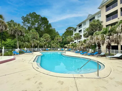 a view of outdoor space yard swimming pool and sitting area