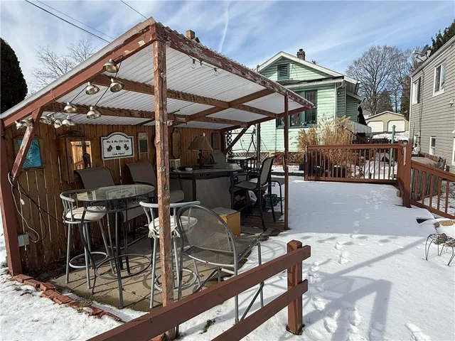 a view of a building with sitting area