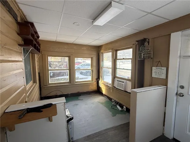 a view of hallway with windows